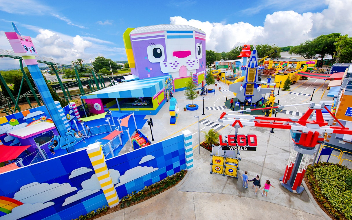 The LEGO MOVIE World entrance at Legoland Florida with colorful attractions and rides.