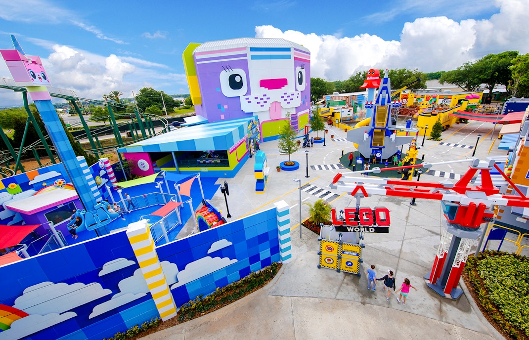 The LEGO MOVIE World entrance at Legoland Florida with colorful attractions and rides.