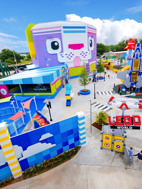The LEGO MOVIE World entrance at Legoland Florida with colorful attractions and rides.