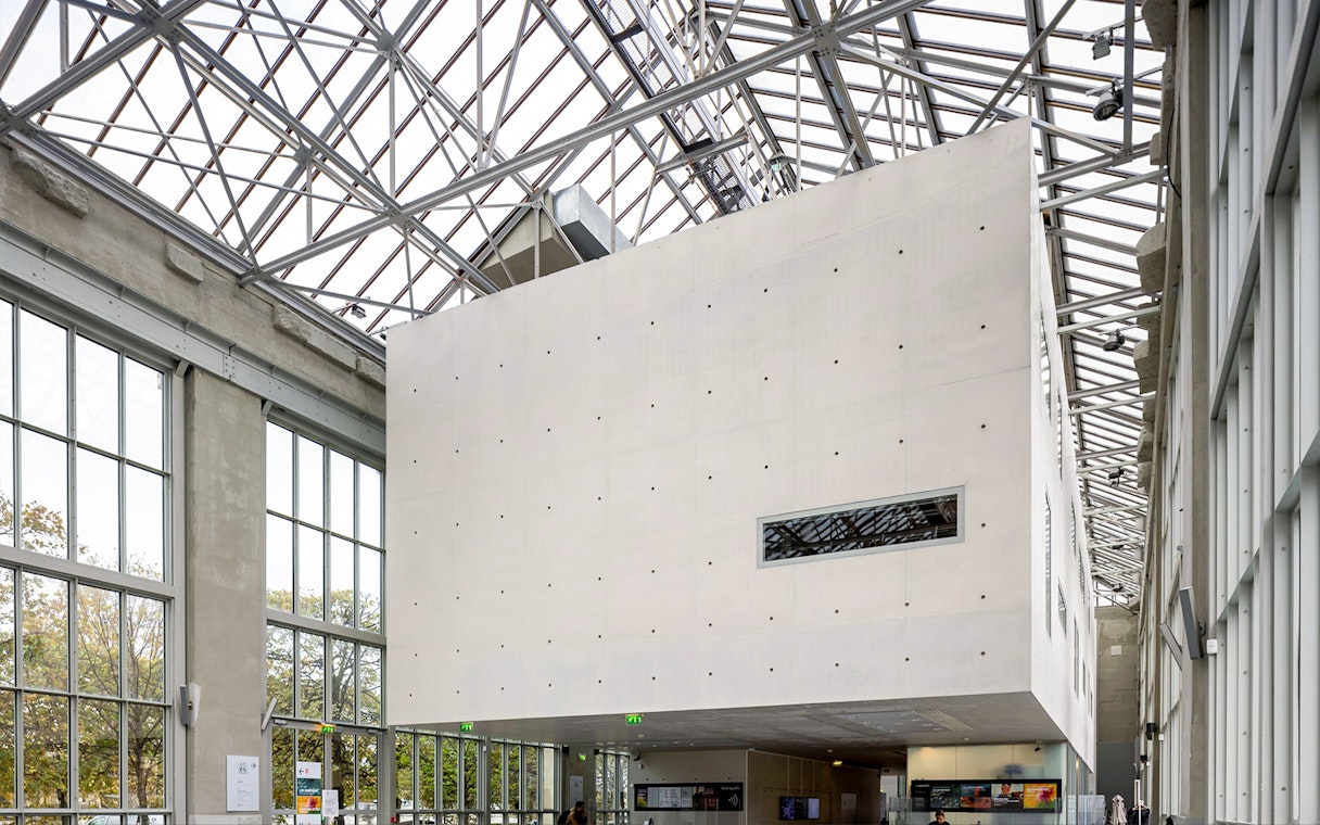 Orangerie Museum interior with modern architecture and large windows.