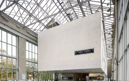 Orangerie Museum interior with modern architecture and large windows.