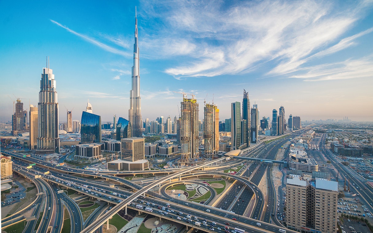 Dubai city center skyline with Burj Khalifa and modern skyscrapers.