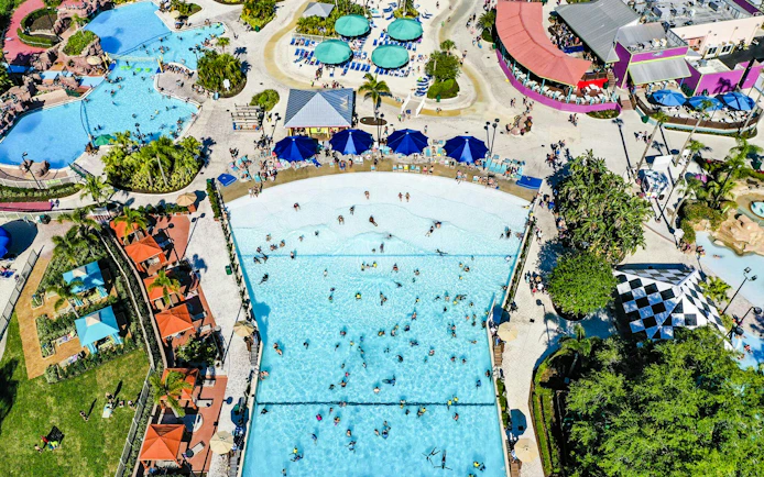 Aerial view of wave pool and sunbathers at Adventure Island, Tampa.