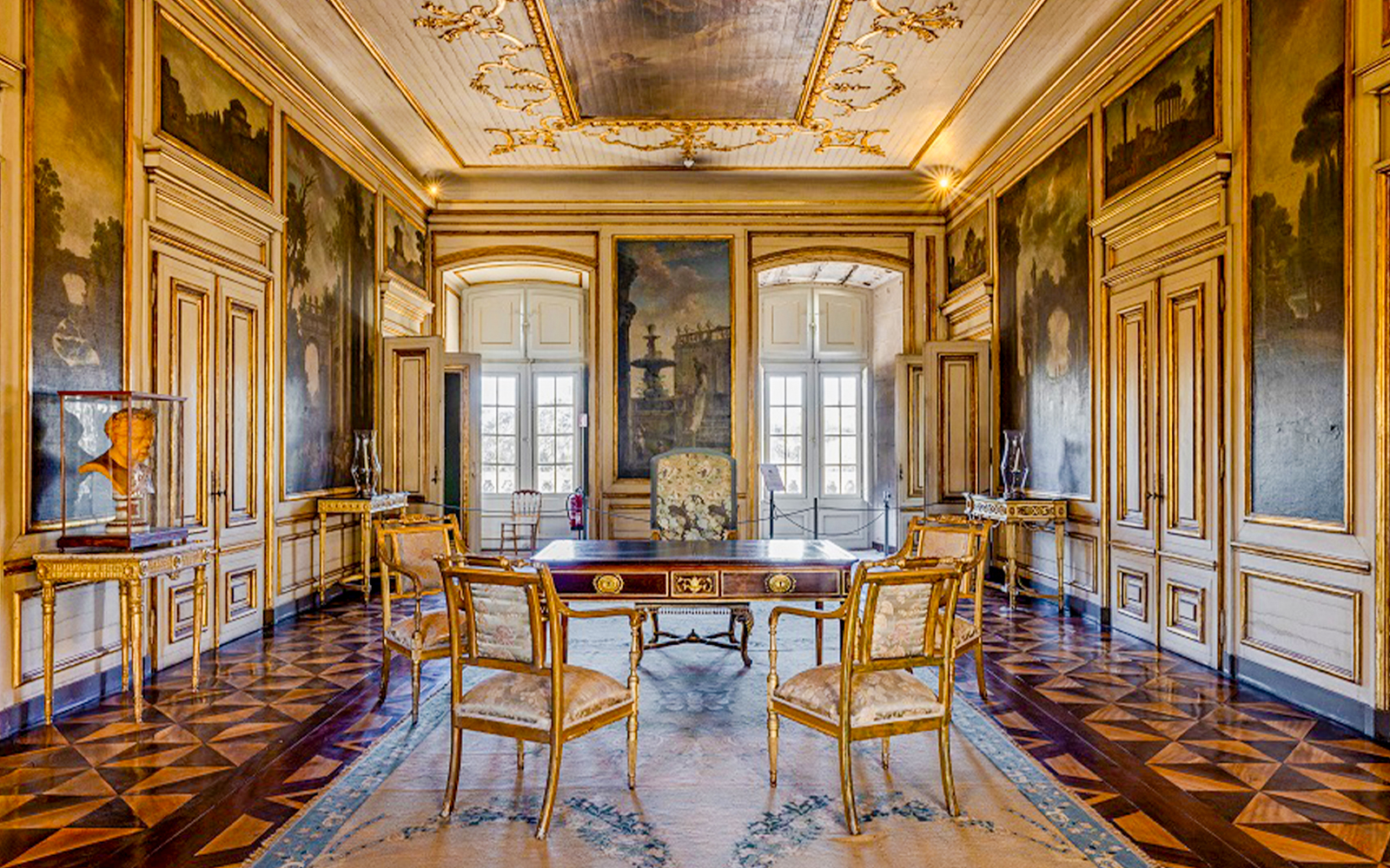 National Palace of Queluz Dispatch Room with ornate decor and antique furniture.