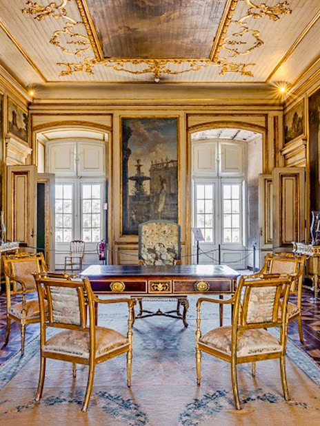 National Palace of Queluz Dispatch Room with ornate decor and antique furniture.
