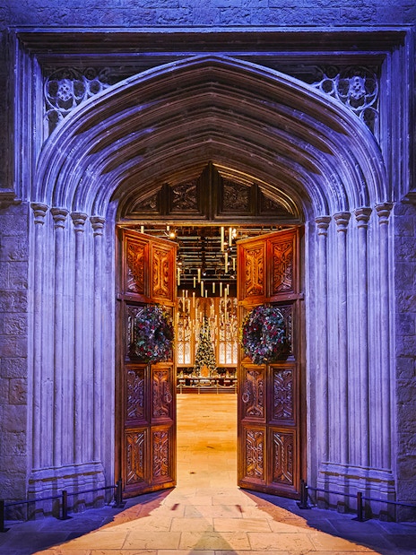 Entrance to the Great Hall decorated for Christmas at Harry Potter Studio Tour Tokyo.