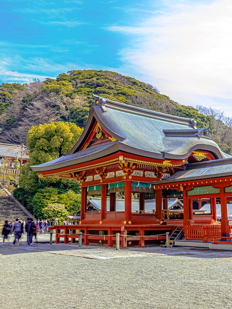 Tsurugaoka Hachimangu Shrine in Kamakura, Japan, with visitors exploring the grounds.