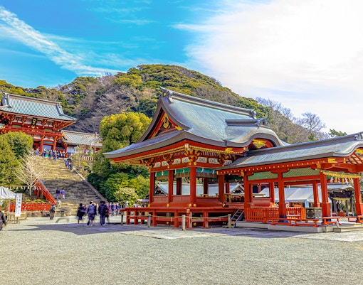 Tsurugaoka Hachimangu Shrine in Kamakura, Japan, with visitors exploring the grounds.
