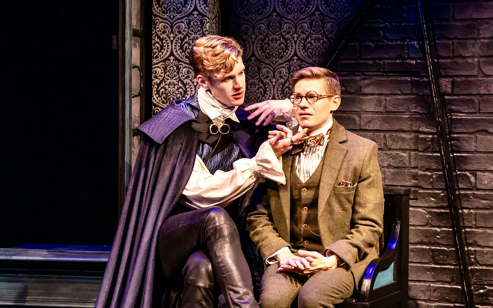 Dracula character in a comedic scene with a nervous man, from "Dracula, A Comedy of Terrors.