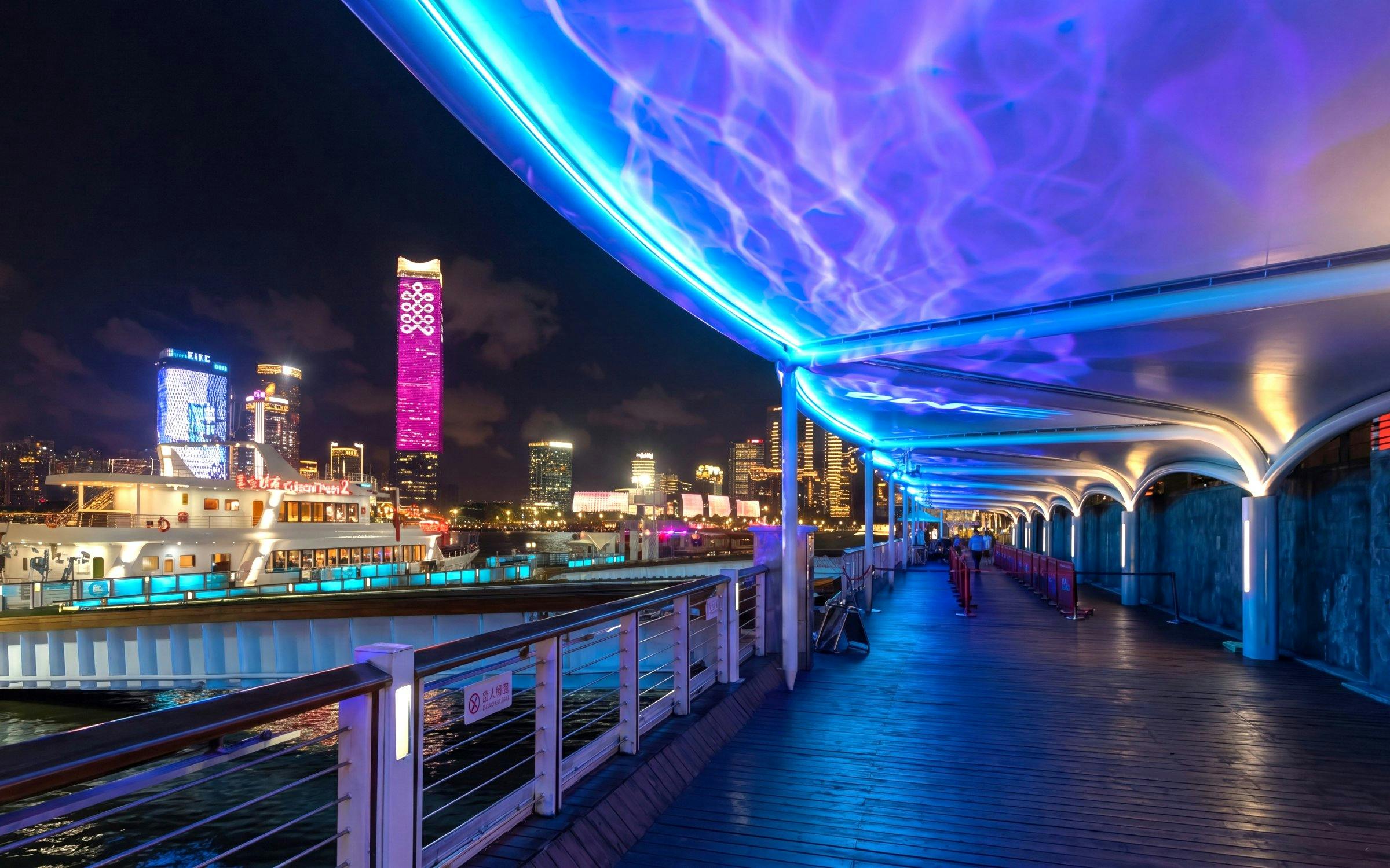 Oriental Pearl Tower Cruise Terminal at night, Shanghai skyline near Binjiang Avenue.
