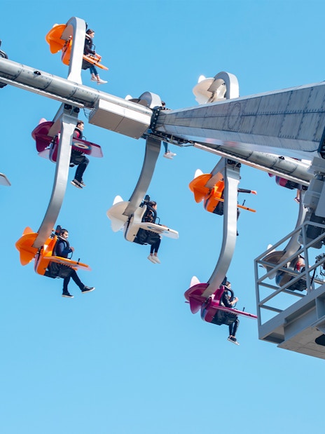 Visitors on a thrilling ride at The Land of Legends Theme Park.