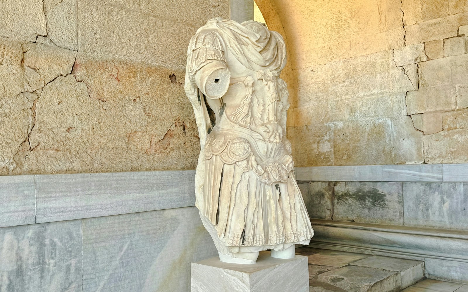 Bust of Hadrian in the Agora, Athens, showcasing detailed Roman armor.