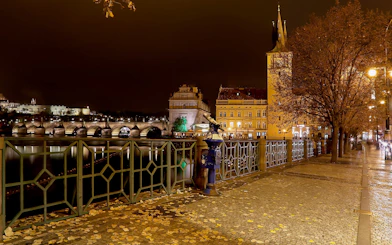 Charles Bridge and Old Town at night, Prague, highlighting the Ghosts and Legends tour.