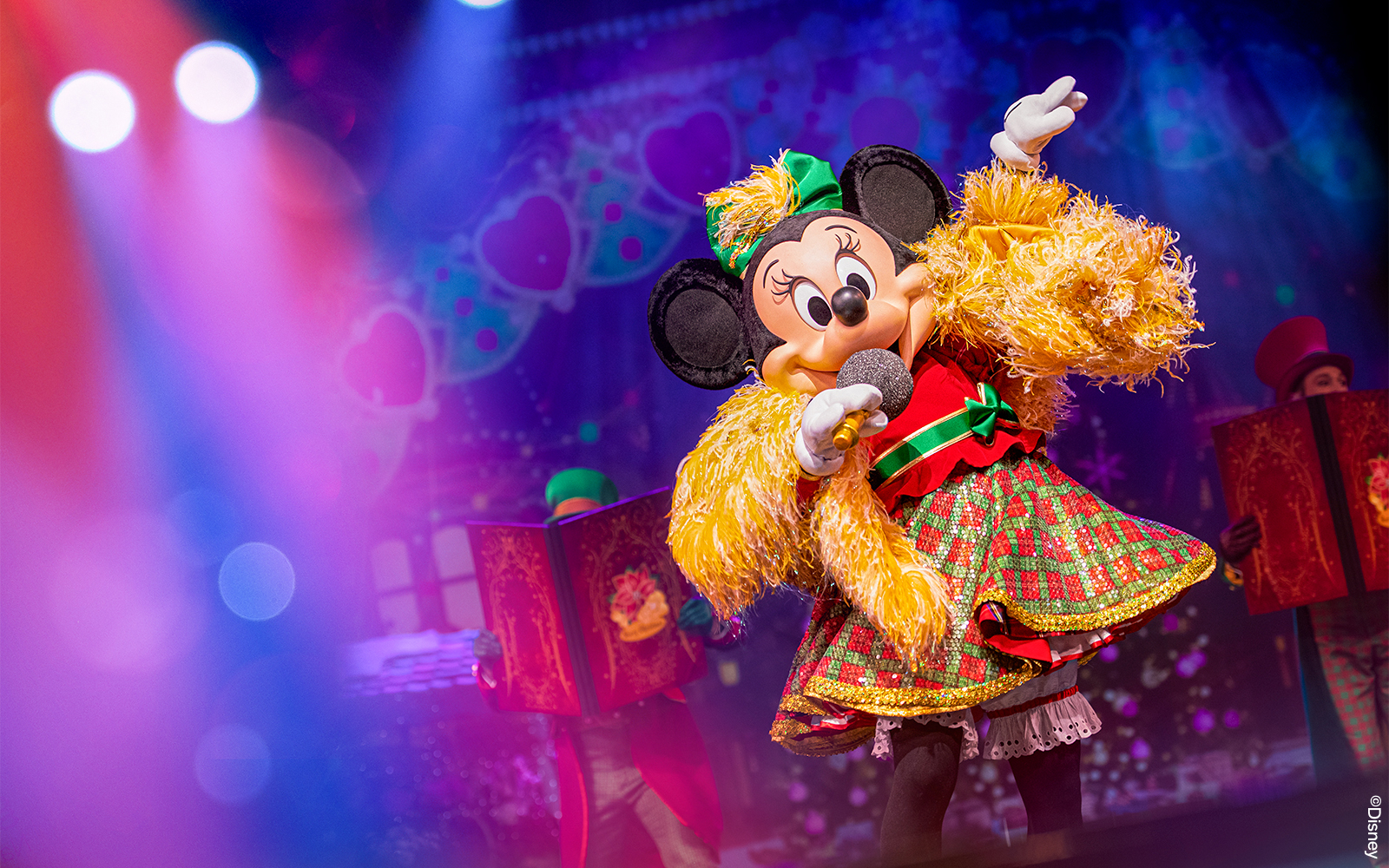Minnie Mouse performing in Disneyland Paris parade during Minnie&#x27;s Musical Moment show.