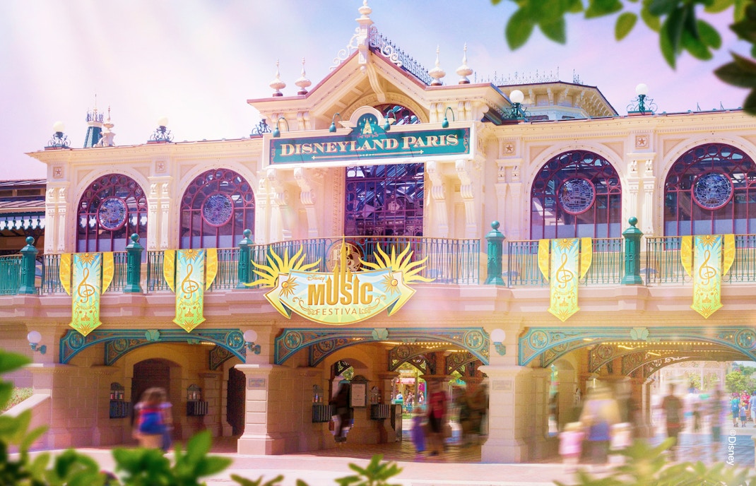 Disney Music Festival parade with colorful floats and characters at Disneyland Paris.