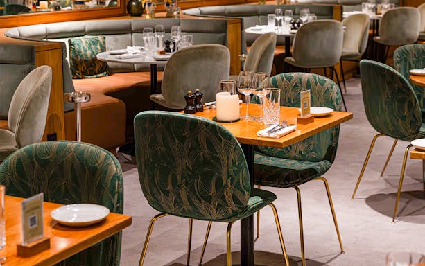 Brunch setup at Flora Danica Paris on the Champs Elysées with elegant table settings.
