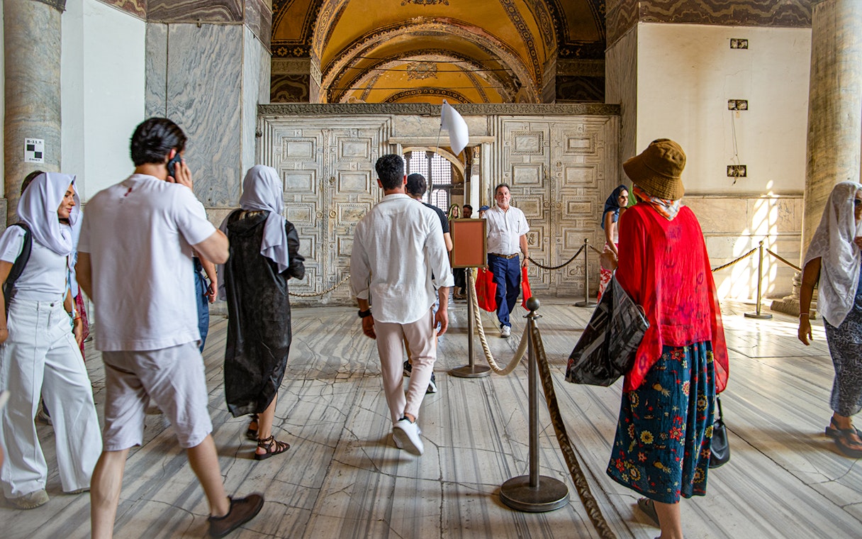Visitors on a guided tour inside Hagia Sophia, Istanbul.