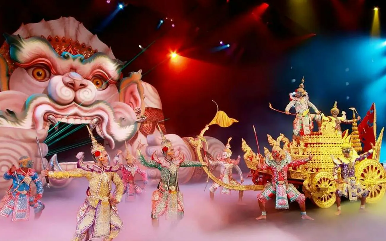 Phuket FantaSea Show performers in traditional costumes with elaborate stage backdrop.