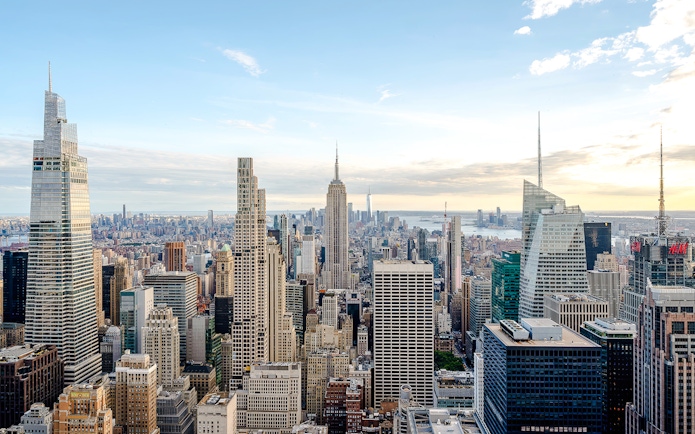 New York City skyline view from Top of the Rock, featuring the Empire State Building.