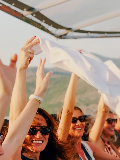 Guests celebrating during Dinner in the Sky experience in Dubrovnik.