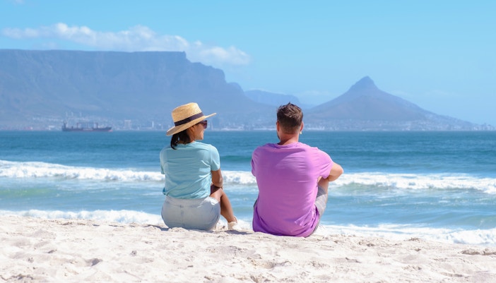 Couple sitting on the beach