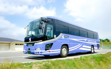 Kansai Airport transfer bus parked at terminal.