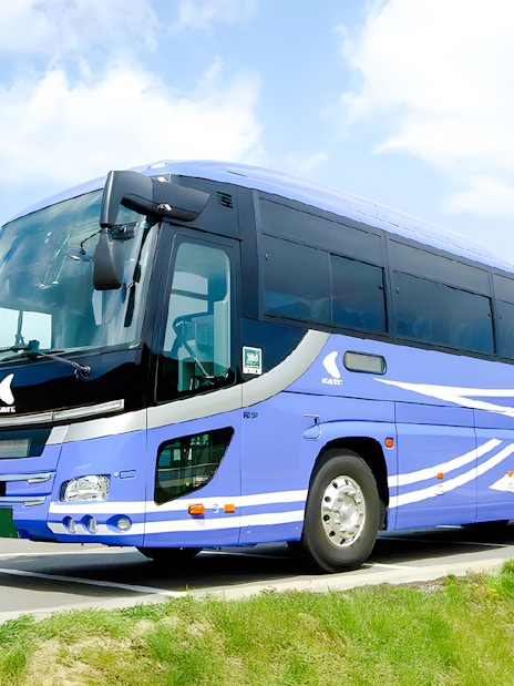 Kansai Airport transfer bus parked at terminal.