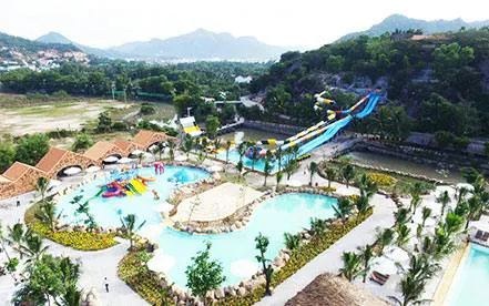 Aerial view of water park with slides and pools near Cai River, Dubai.