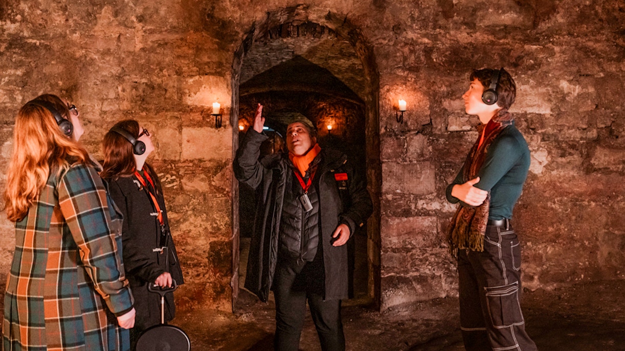 Guide leading guests through Blair Street Vaults tour.