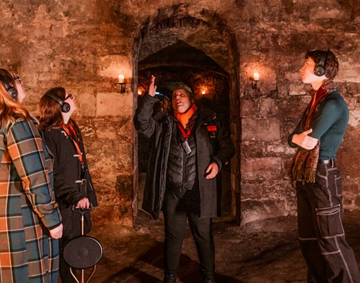 Guide leading guests through Blair Street Vaults tour.