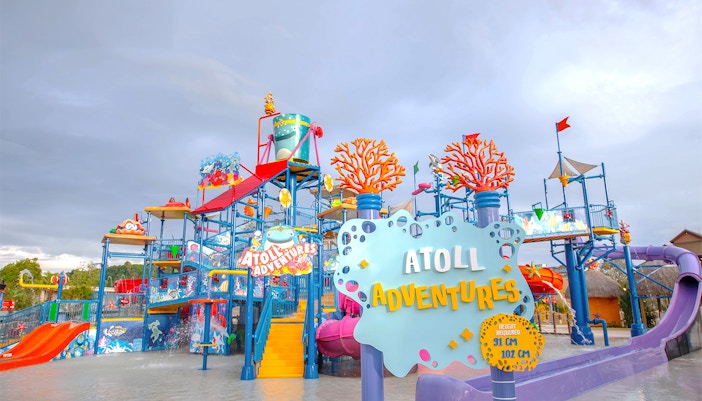 Water park attractions at Andamanda Phuket Atoll Adventures, featuring slides and pools in Phuket, Thailand.