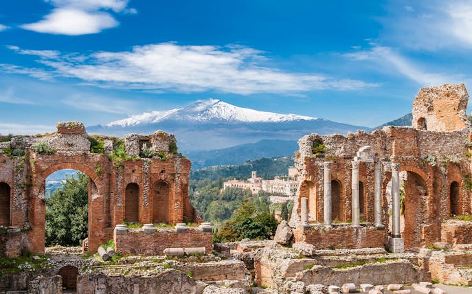 Ancient Theater of Taormina with Mount Etna in the background, Sicily.