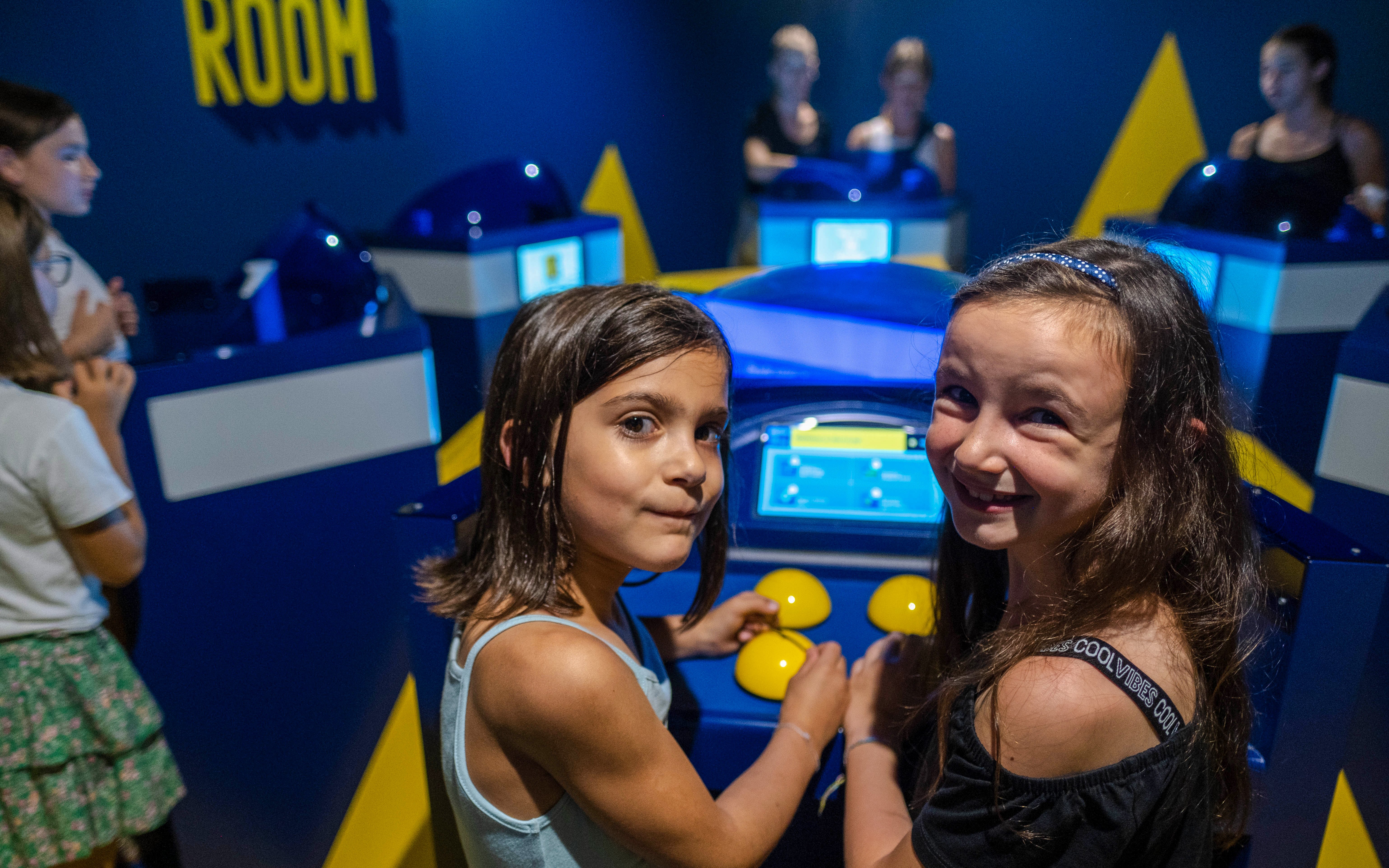 Children engaging in Quiz Room game show experience, Dubai.