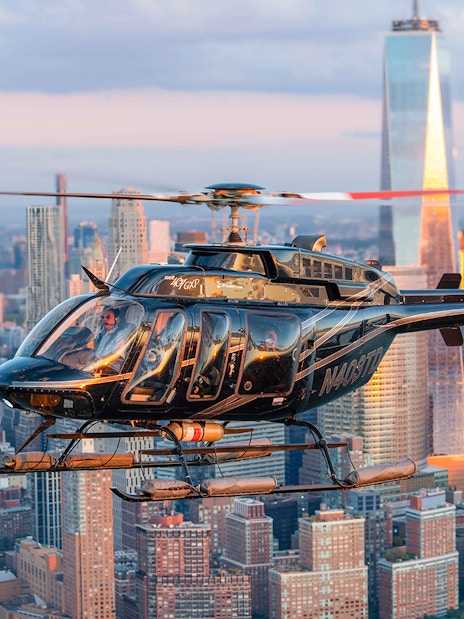 Helicopter flying over New York City skyline during 20-minute tour.