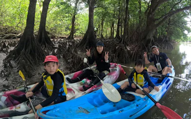 #Family kayaking through mangroves on Ishigaki Private Half-Day SUP/Canoe Tour, Okinawa.
