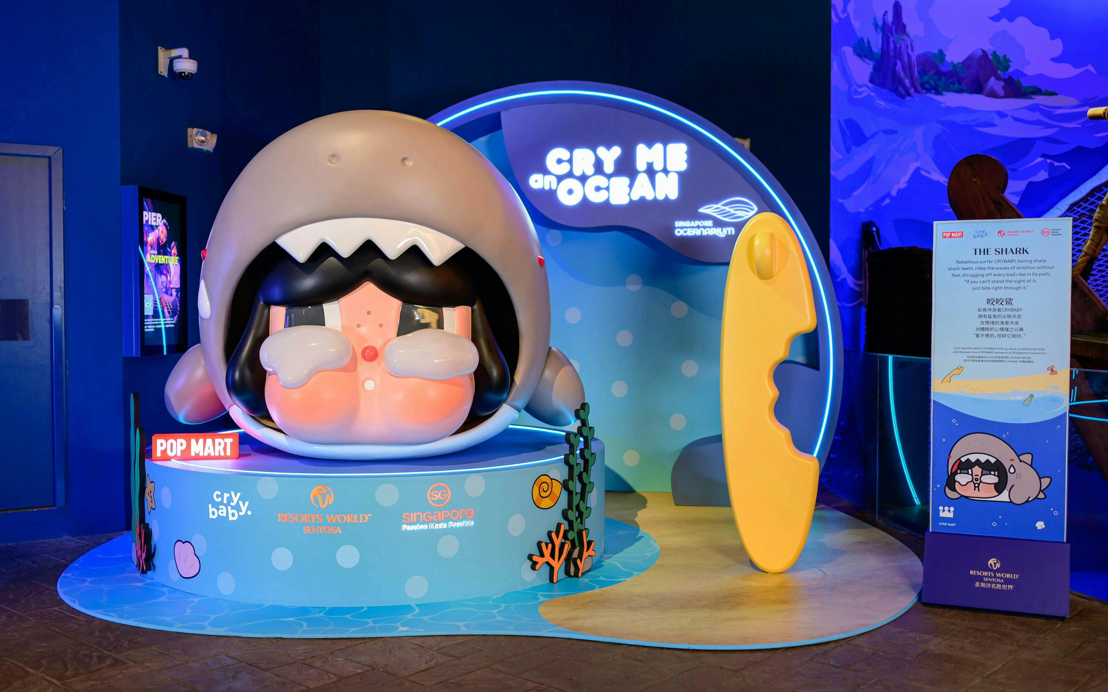 Interactive shark-themed display at Singapore Oceanarium featuring Pop Mart character.