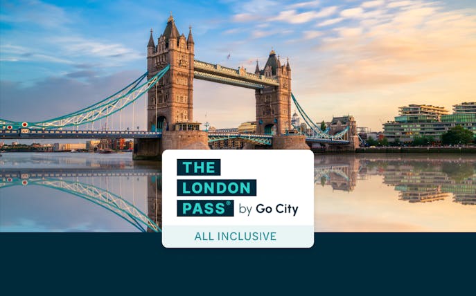 Tower Bridge over Thames River at sunset in London, England.