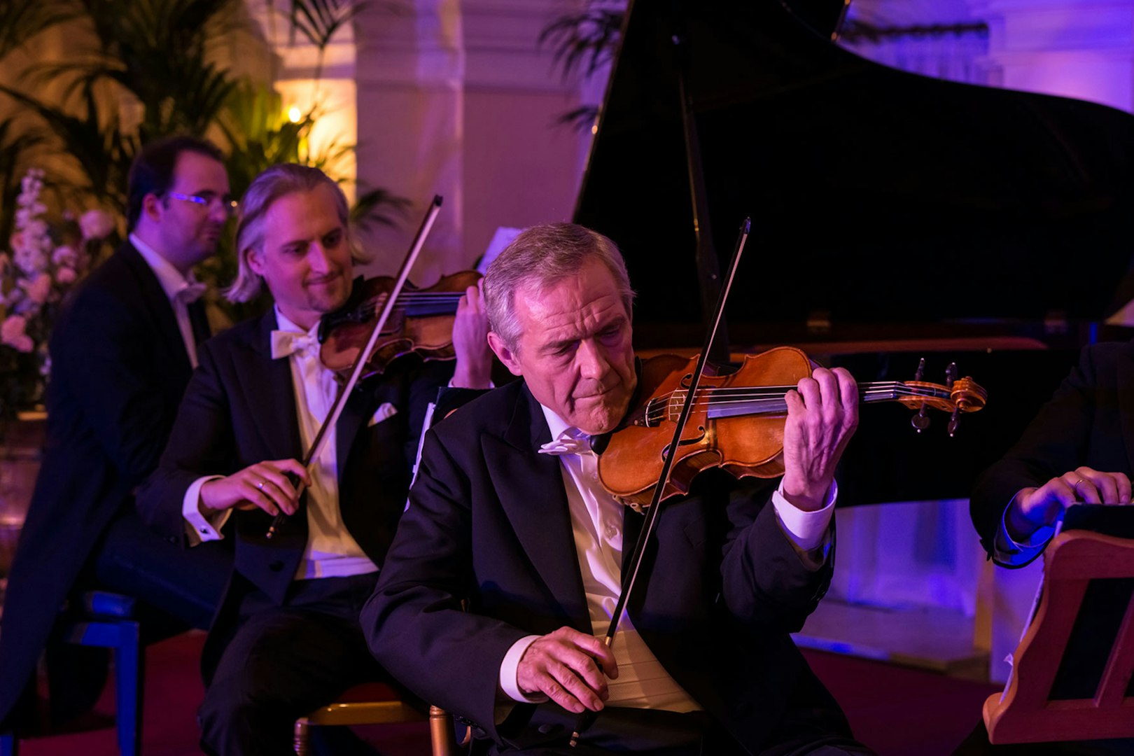 Violinists performing at Mozart and Strauss concert in Kursalon Vienna.