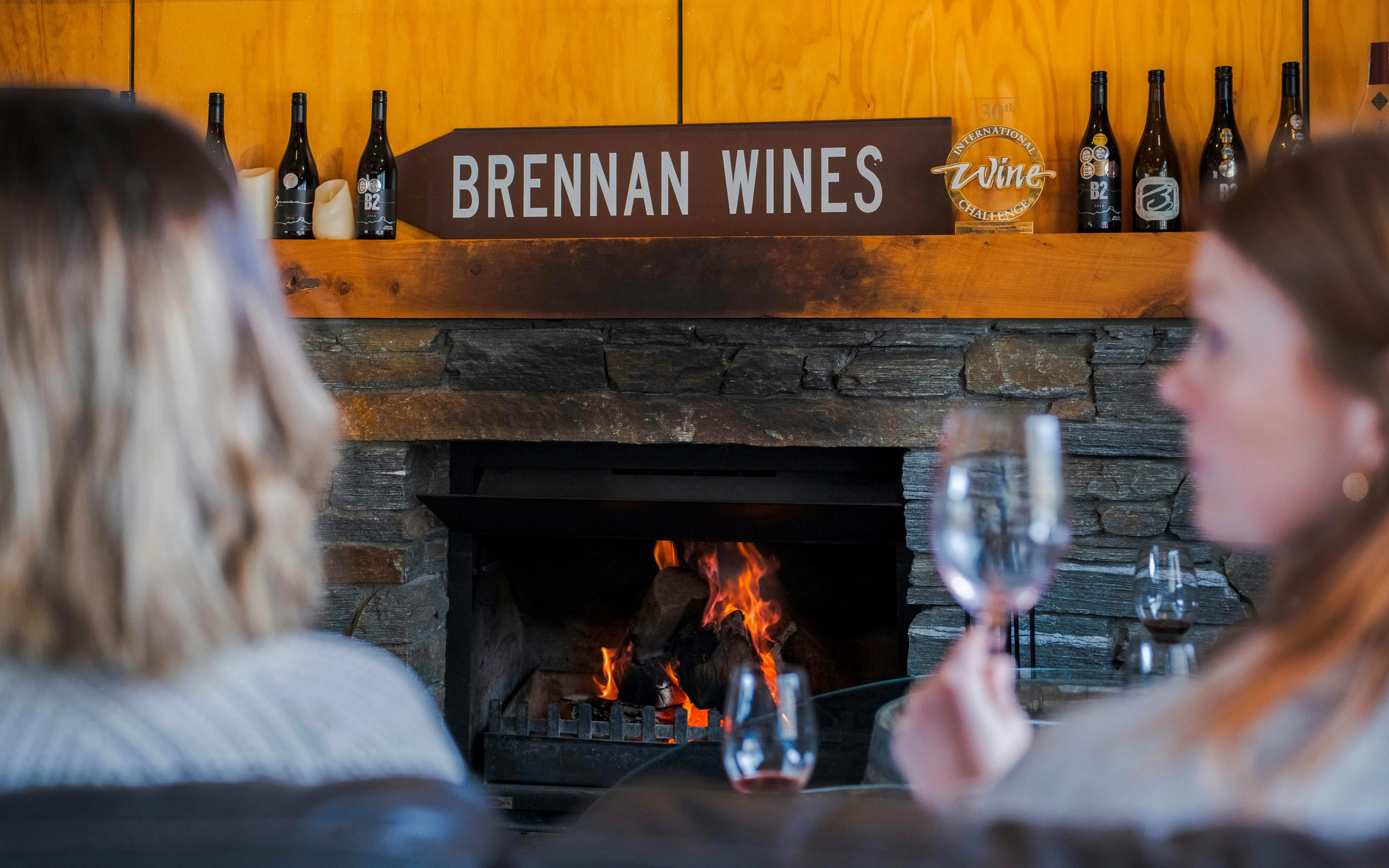 Brennan Wines tasting room with fireplace, Queenstown Wine Tours.