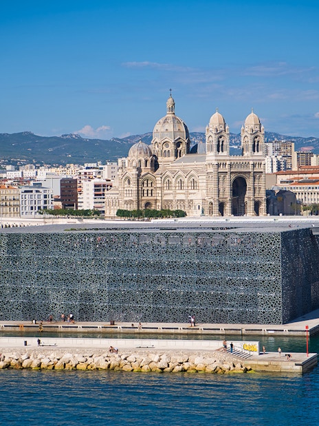 Mucem museum and Marseille Cathedral with cityscape in Marseille, France.
