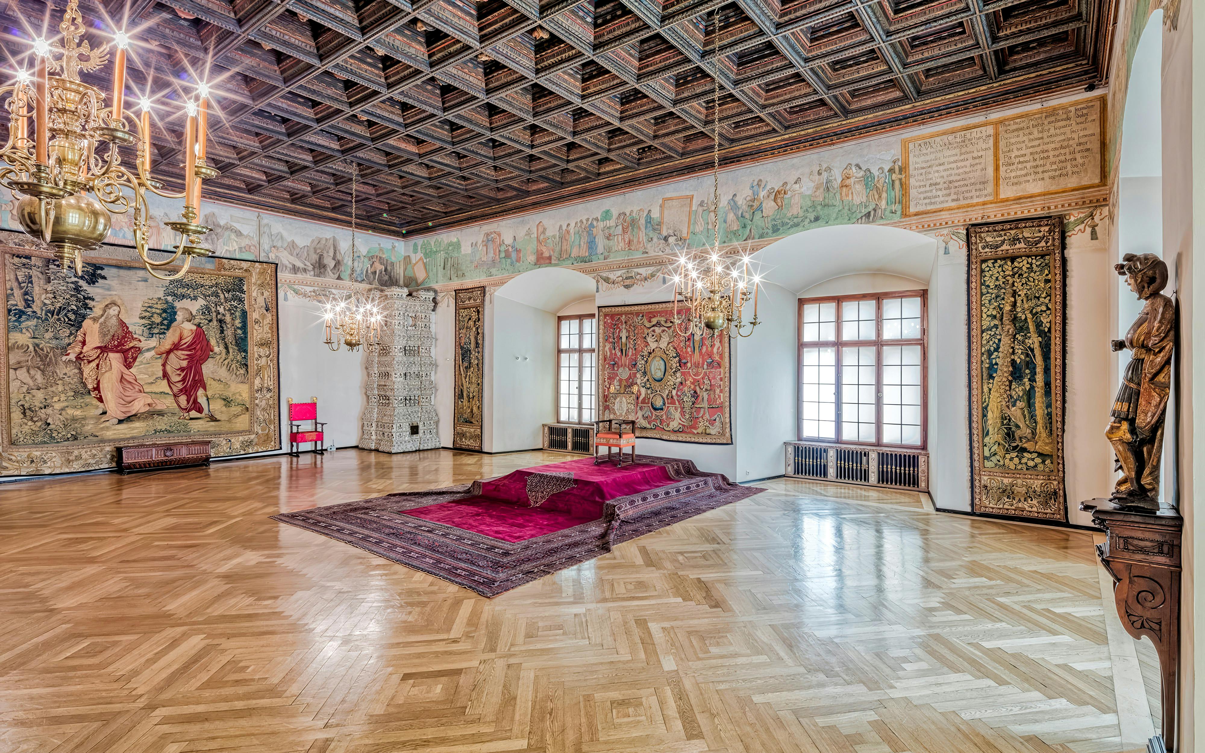Wawel Castle 2nd floor room with tapestries and chandeliers, Krakow, Poland.