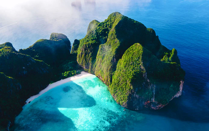 Phi Phi Islands' limestone cliffs and turquoise waters, Thailand.