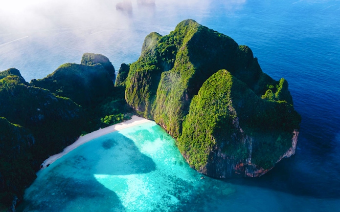 Phi Phi Islands' limestone cliffs and turquoise waters, Thailand.