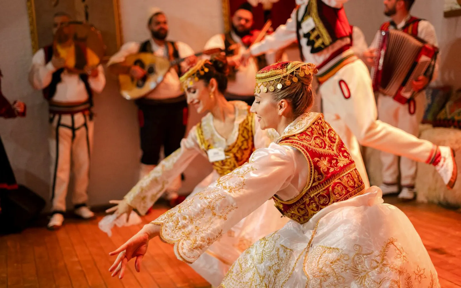 Artists performing traditional dance during Albanian Night Cultural Dance & Music Experience.
