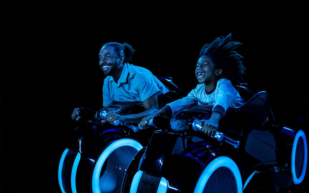 Guests enjoying Tron Lightcycle ride at Walt Disney World Resort, Orlando.