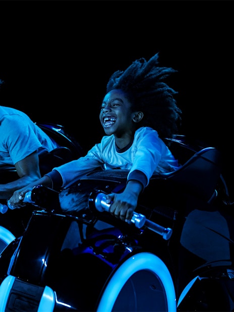 Guests enjoying Tron Lightcycle ride at Walt Disney World Resort, Orlando.