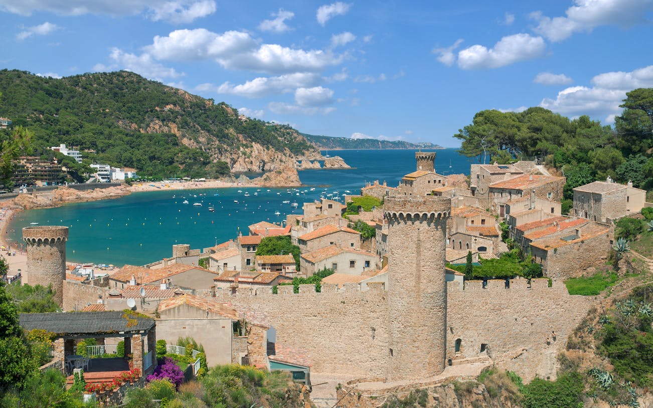 Tossa de Mar seaside resort town with medieval castle walls on Costa Brava, Catalonia, Spain.