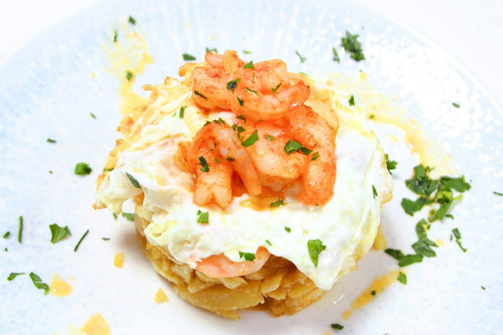 Garlic prawn salad with fried eggs at Tablao La Cantaora, Seville.