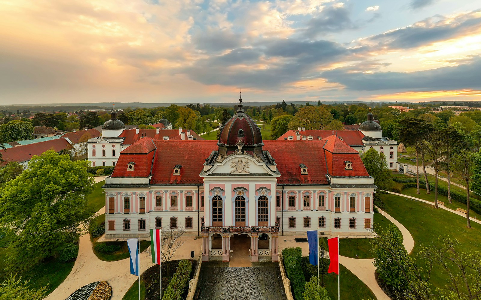 Gödöllő Royal Palace with red roof and gardens, Budapest tour.