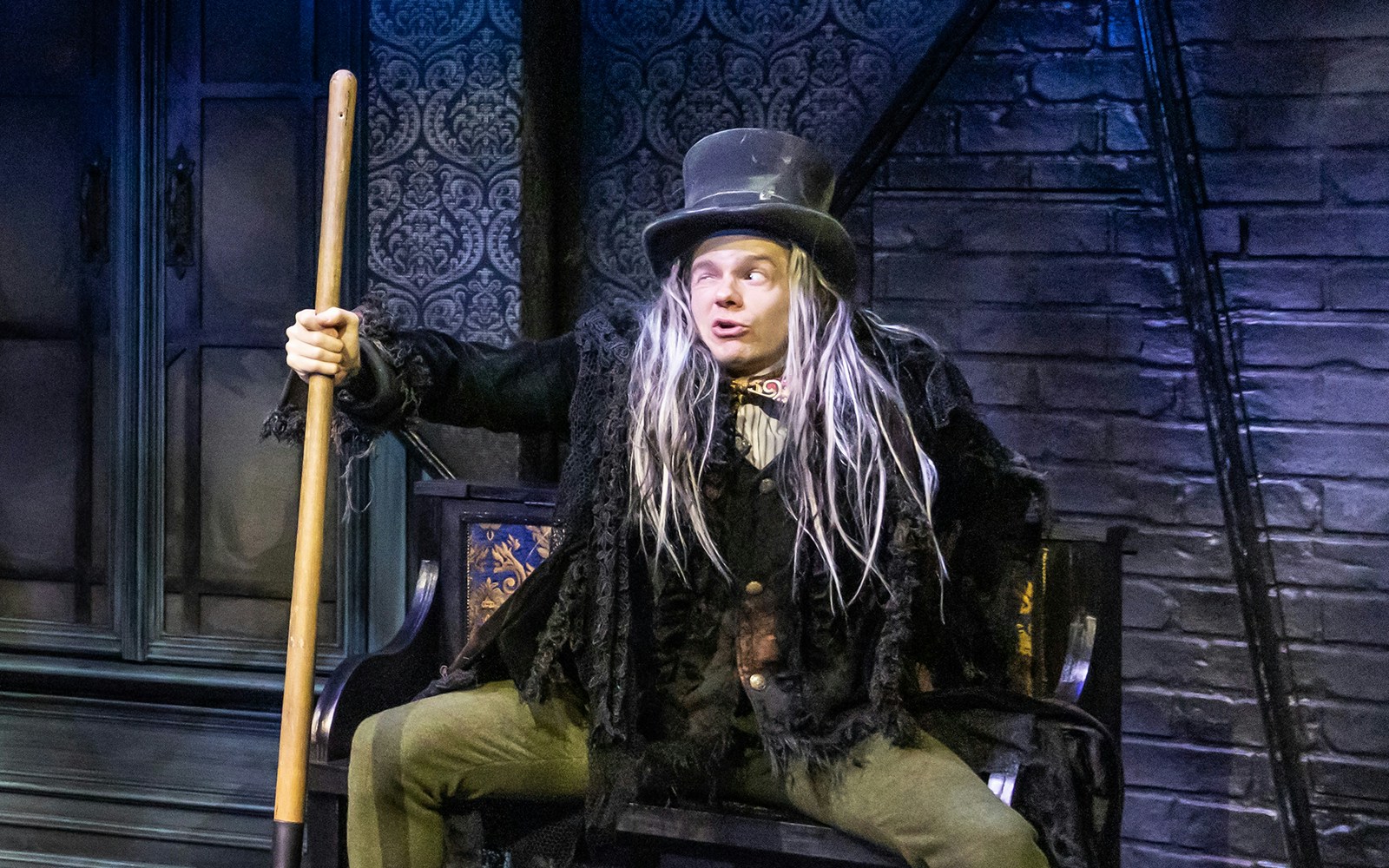 Actor in costume performing in "Dracula, A Comedy of Terrors" on stage.